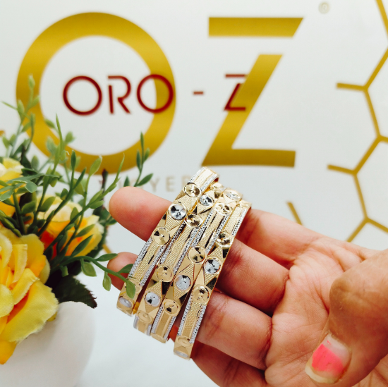 gold machine cut bangles