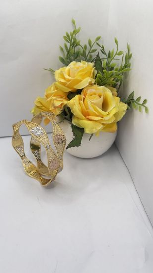 Statement gold bangles