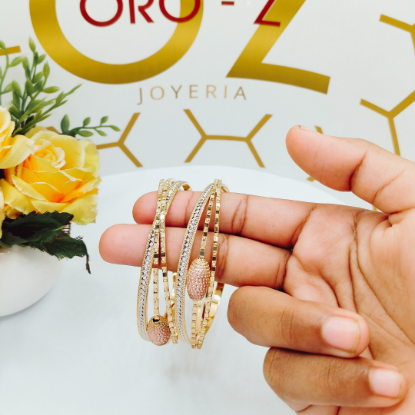 Picture of New Classic Luxury and Trendy CNC Gold Tokyo Bangles With Sparkling Touch.