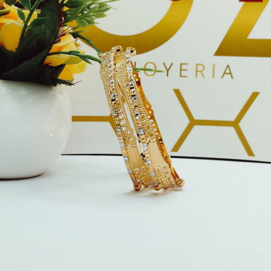 Picture of Exclusive Overlapping Gold CNC Tokyo Bangles