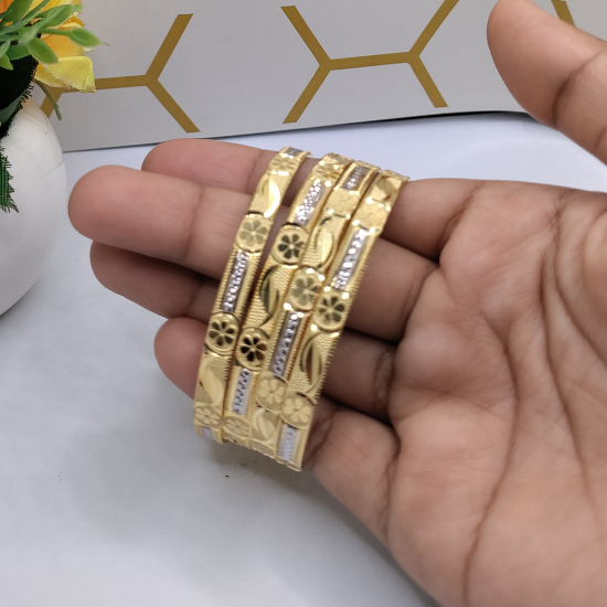 Picture of Tradition Vibes London CNC Gold Bangles With Flower Design.