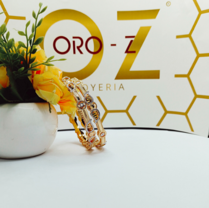 Designer gold bangles