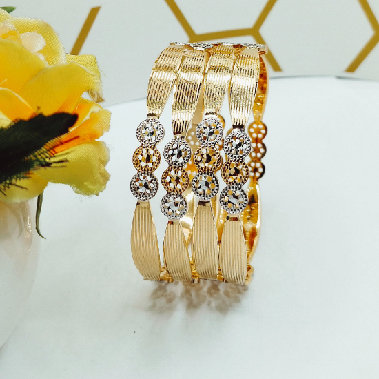 Precision laser cut gold bangles