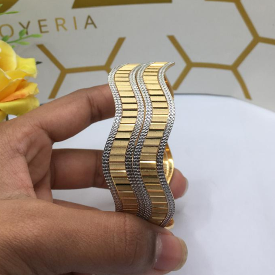 Sleek fashionable gold bangles