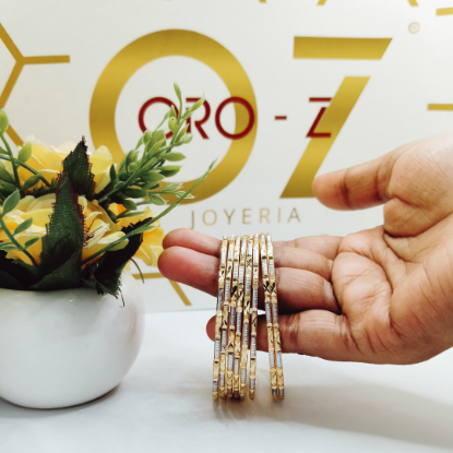 gold bangles with fine detailing